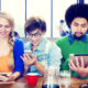 group of people interacting with mobile devices
